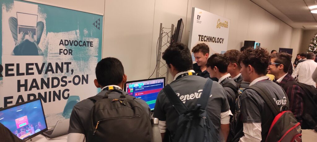 Students playing a financial literacy computer game at the JA Malta stand, at the EY Generate event.